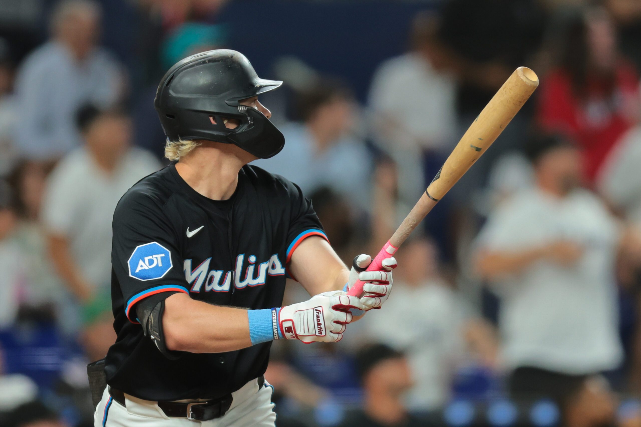 Aug 1, 2025; Miami, Florida, USA; Miami Marlins left fielder Kyle Stowers (28) hits a grand slam against the New York Yankees seventh inning at loanDepot Park. Mandatory Credit: Sam Navarro-Imagn Images
