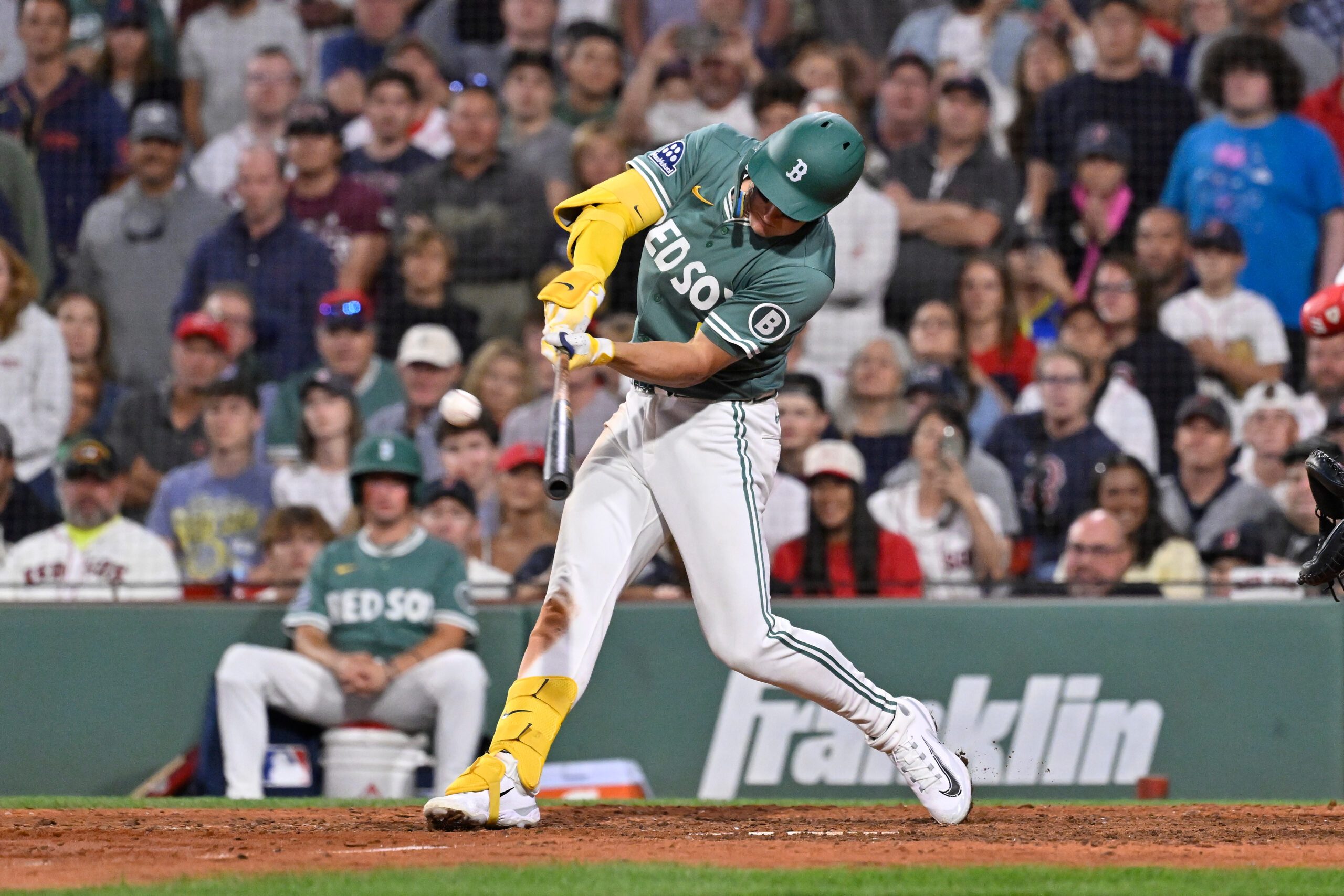 Aug 1, 2025; Boston, Massachusetts, USA; Boston Red Sox left fielder Roman Anthony (19) hits a game winning RBI against the Houston Astros during the tenth inning inning at Fenway Park. Mandatory Credit: Eric Canha-Imagn Images