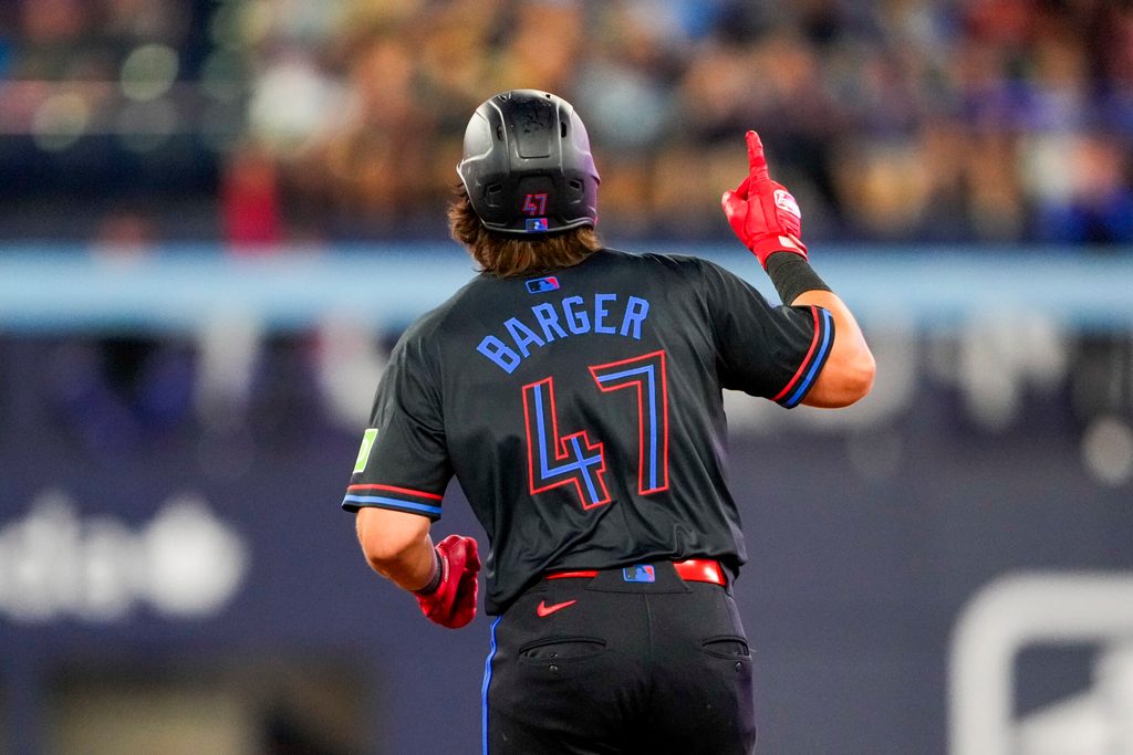 Aug 1, 2025; Toronto, Ontario, CAN; Toronto Blue Jays third base Addison Barger (47) celebrates hitting a home run against the Kansas City Royals during the ninth inning at Rogers Centre. Mandatory Credit: Kevin Sousa-Imagn Images