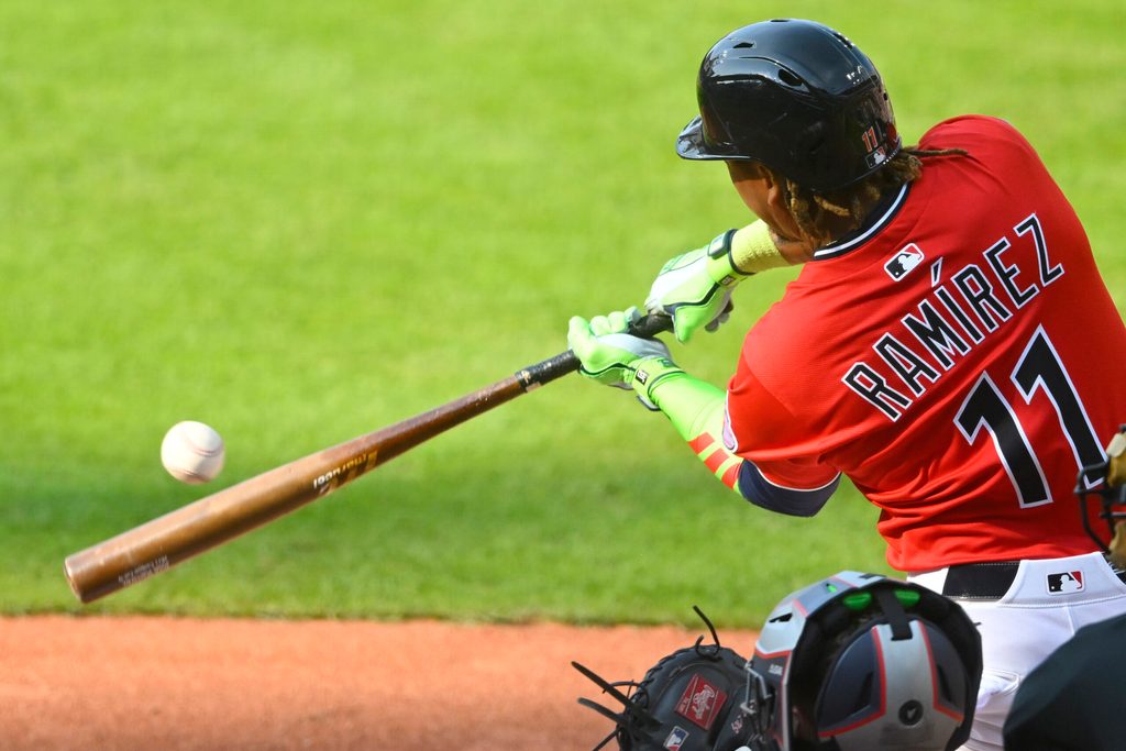Aug 2, 2025; Cleveland, Ohio, USA; Cleveland Guardians third baseman Jose Ramirez (11) hits a two-run home run in the fifth inning against the Minnesota Twins at Progressive Field. Mandatory Credit: David Richard-Imagn Images