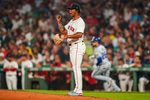 Aug 4, 2025; Boston, Massachusetts, USA; Boston Red Sox pitcher Brayan Bello (66) reacts after a line drive out by Kansas City Royals outfielder Kyle Isbel (28) to end the side in the fourth inning at Fenway Park. Mandatory Credit: David Butler II-Imagn Images