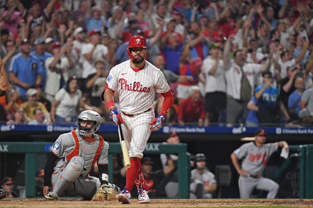 Aug 4, 2025; Philadelphia, Pennsylvania, USA; Philadelphia Phillies outfielder Kyle Schwarber (12) watches his grand slam home run during the sixth inning against the Baltimore Orioles at Citizens Bank Park. Mandatory Credit: Eric Hartline-Imagn Images