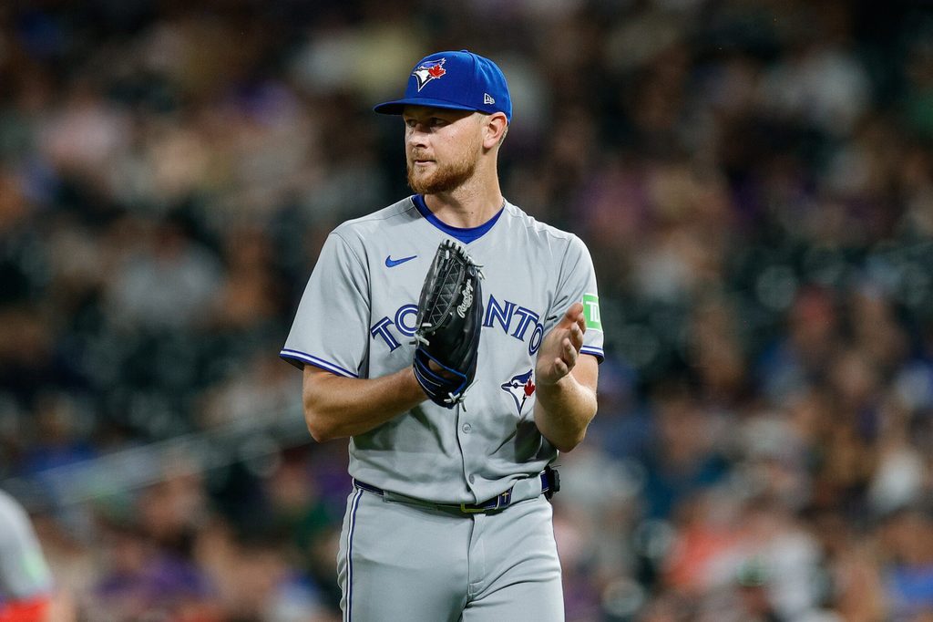 Aug 4, 2025; Denver, Colorado, USA; Toronto Blue Jays starting pitcher Eric Lauer (56) reacts at the end of the sixth inning against the Colorado Rockies at Coors Field. Mandatory Credit: Isaiah J. Downing-Imagn Images