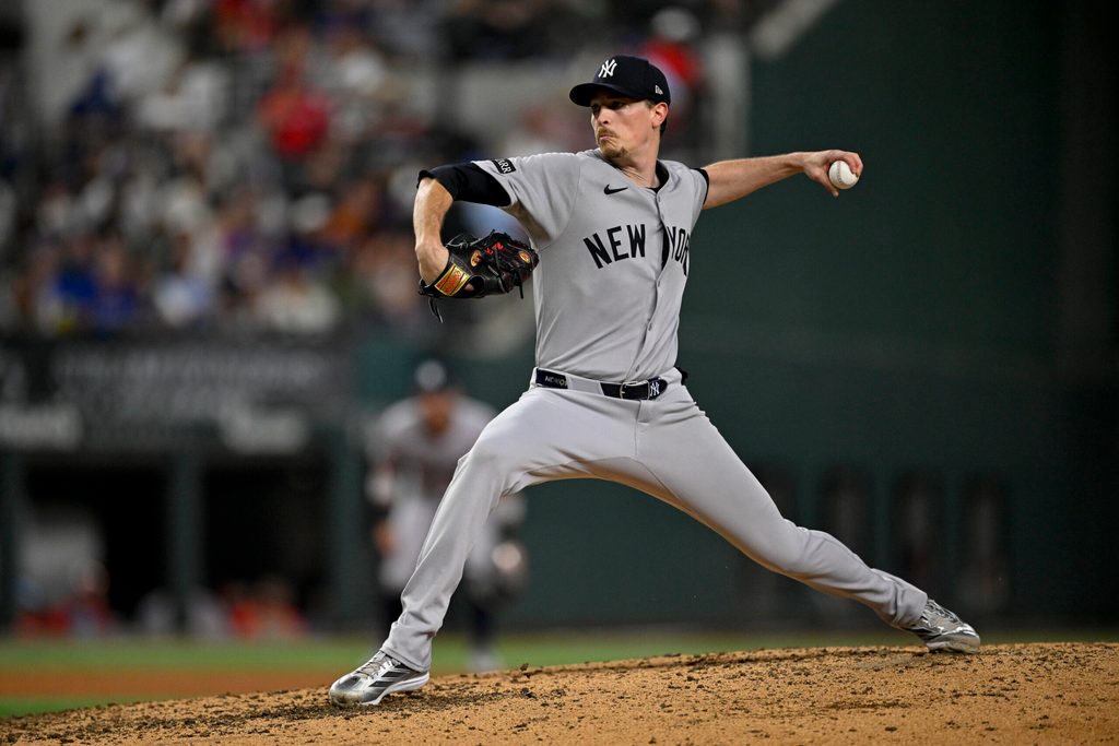 Aug 4, 2025; Arlington, Texas, USA; New York Yankees starting pitcher Max Fried (54) in action during the game between the Texas Rangers and the New York Yankees at Globe Life Field. Mandatory Credit: Jerome Miron-Imagn Images