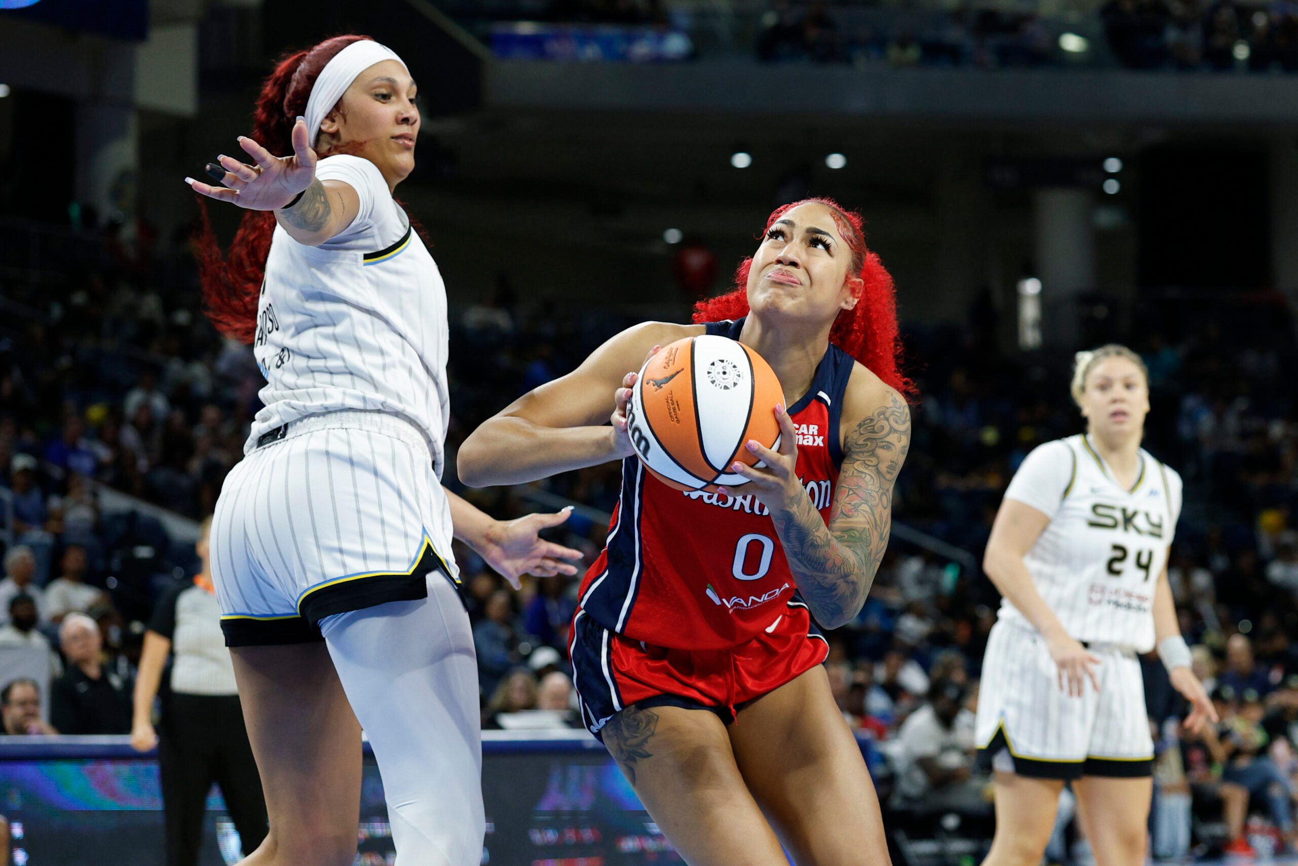 Aug 5, 2025; Chicago, Illinois, USA; Washington Mystics forward Shakira Austin (0) drives to the basket against Chicago Sky center Kamilla Cardoso (10) during the second half at Wintrust Arena. Mandatory Credit: Kamil Krzaczynski-Imagn Images