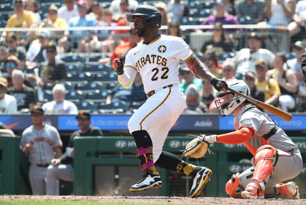 Aug 6, 2025; Pittsburgh, Pennsylvania, USA; Pittsburgh Pirates designated hitter Andrew McCutchen (22) hits a single against the San Francisco Giants during the eighth inning at PNC Park. Mandatory Credit: Charles LeClaire-Imagn Images