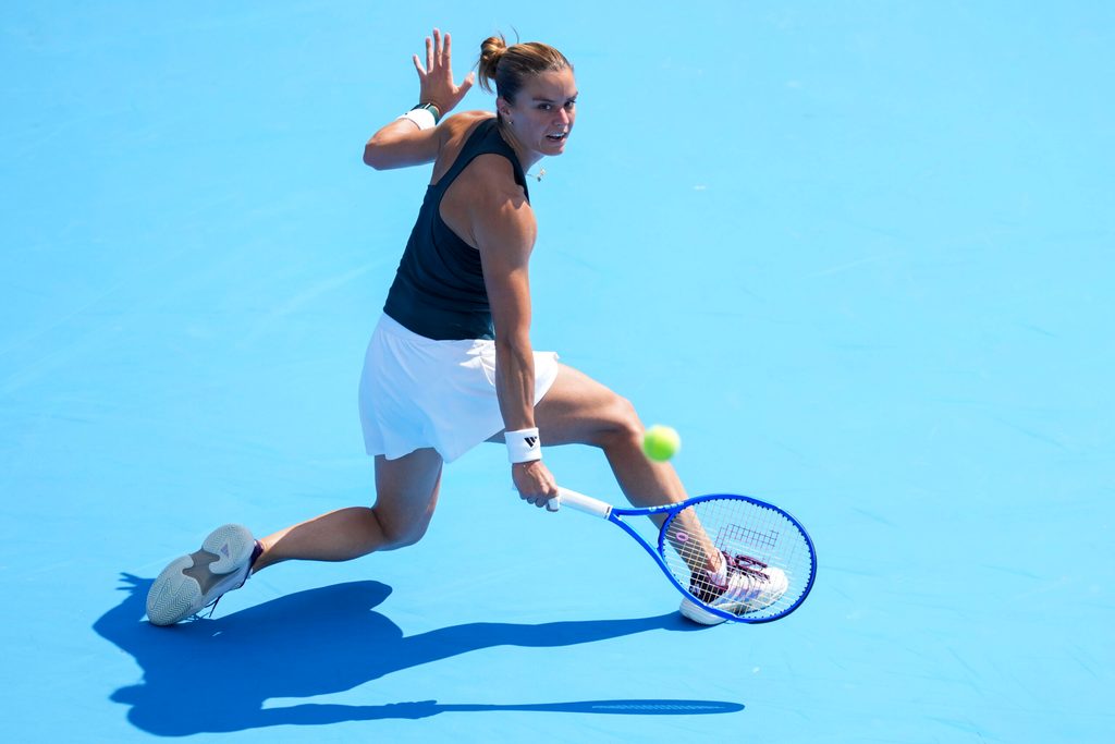 Aug 8, 2025; Cincinnati, OH, USA; Maria Sakkari (GRE) returns a shot against Kamilla Rakhimova (RUS) during the Cincinnati Open at the Lindner Family Tennis Center. Mandatory Credit: Aaron Doster-Imagn Images