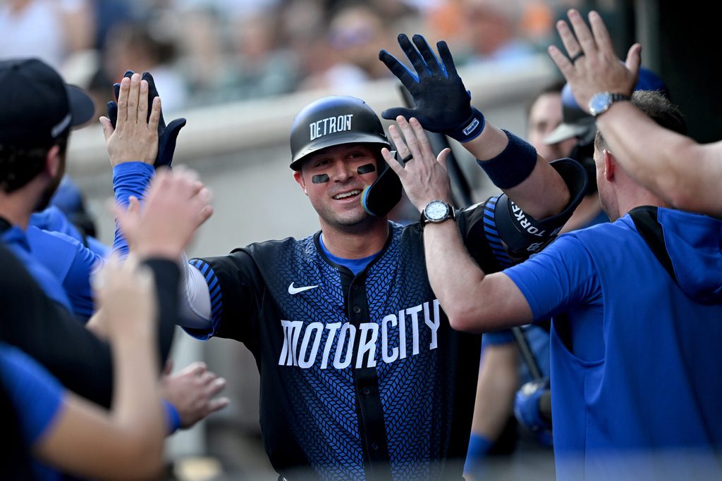 Aug 8, 2025; Detroit, Michigan, USA; Detroit Tigers first base Spencer Torkelson (20) celebrates in the dugout after hitting a solo home run against the Los Angeles Angels in the second inning at Comerica Park. Mandatory Credit: Lon Horwedel-Imagn Images