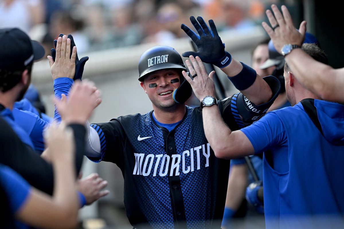 Aug 8, 2025; Detroit, Michigan, USA; Detroit Tigers first base Spencer Torkelson (20) celebrates in the dugout after hitting a solo home run against the Los Angeles Angels in the second inning at Comerica Park. Mandatory Credit: Lon Horwedel-Imagn Images