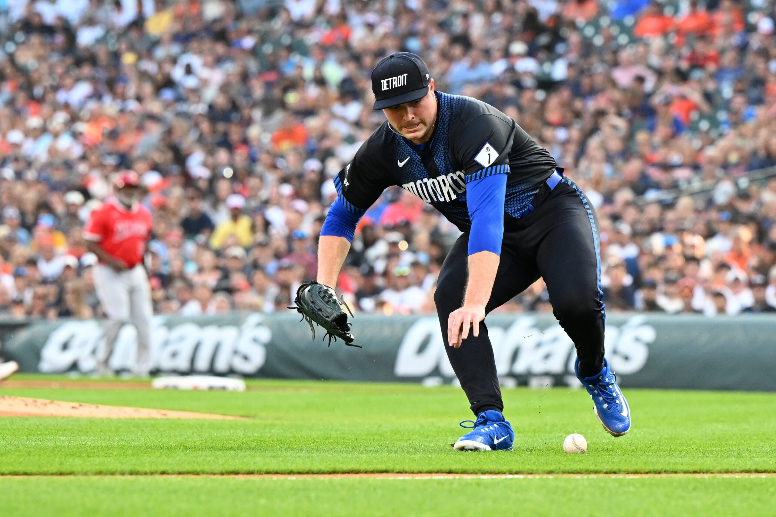 Aug 8, 2025; Detroit, Michigan, USA; Detroit Tigers starting pitcher Tarik Skubal (29) chases down a slow roller on the third base line against the Los Angeles Angels in the first inning at Comerica Park. Mandatory Credit: Lon Horwedel-Imagn Images