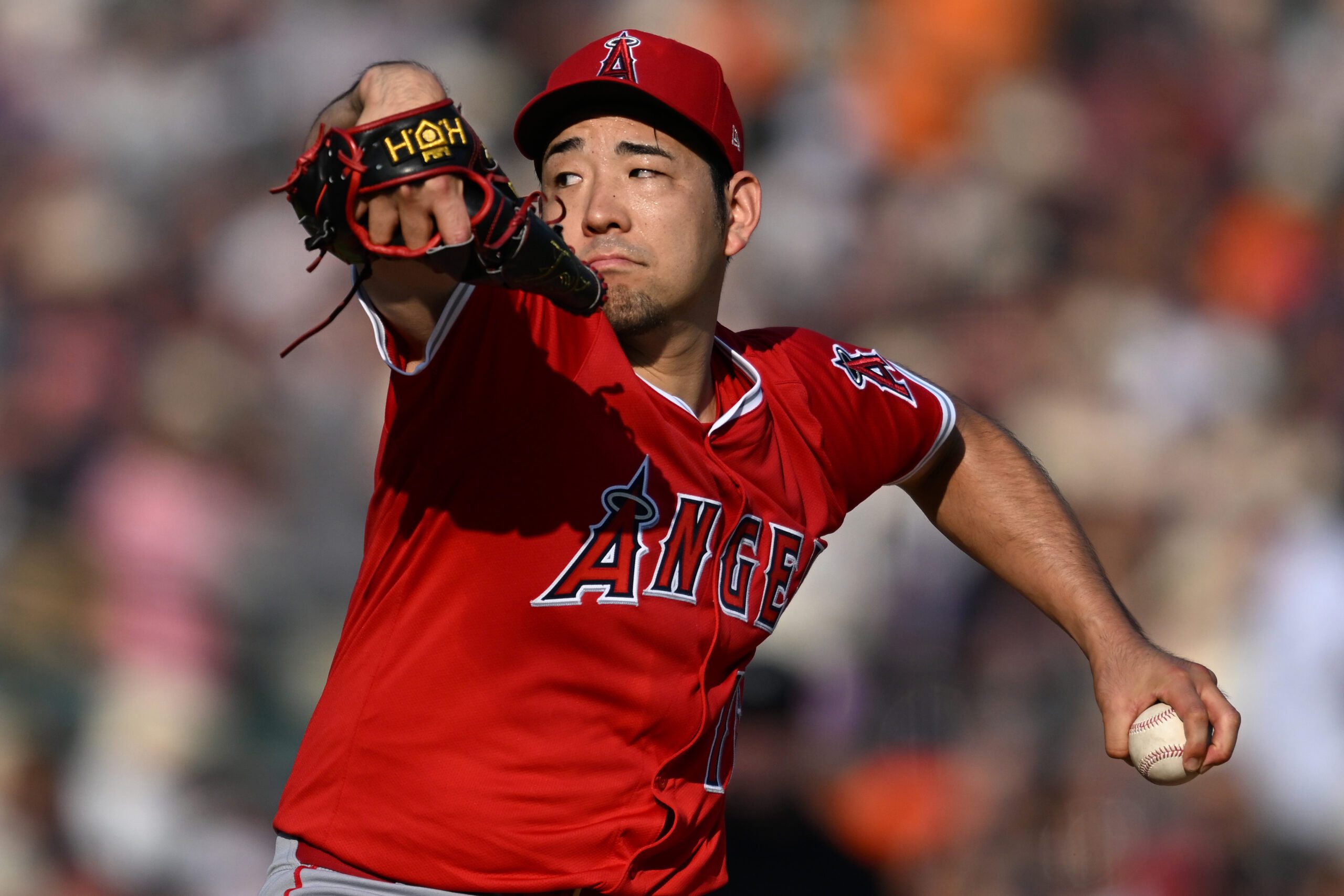 Aug 9, 2025; Detroit, Michigan, USA;  Los Angeles Angels starting pitcher Yusei Kikuchi (16) throws a pitch against the Detroit Tigers in the first inning at Comerica Park. Mandatory Credit: Lon Horwedel-Imagn Images