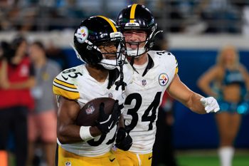 Pittsburgh Steelers wide receiver Ke'Shawn Williams (85) runs off the field with running back Lew Nichols (35) who reacts to Williams’ touchdown score during the fourth quarter of an NFL preseason matchup at EverBank Stadium, Saturday, Aug. 9, 2025 in Jacksonville, Fla. The Steelers defeated the Jaguars 31-25. [Corey Perrine/Florida Times-Union]