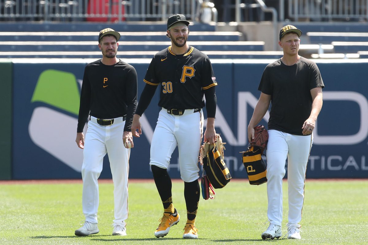 Aug 10, 2025; Pittsburgh, Pennsylvania, USA; Pittsburgh Pirates pitchers Andrew Heaney (left) and Paul Skenes (30) and Mitch Keller (right) walk in from the bullpen before the game against the Cincinnati Reds at PNC Park. Mandatory Credit: Charles LeClaire-Imagn Images