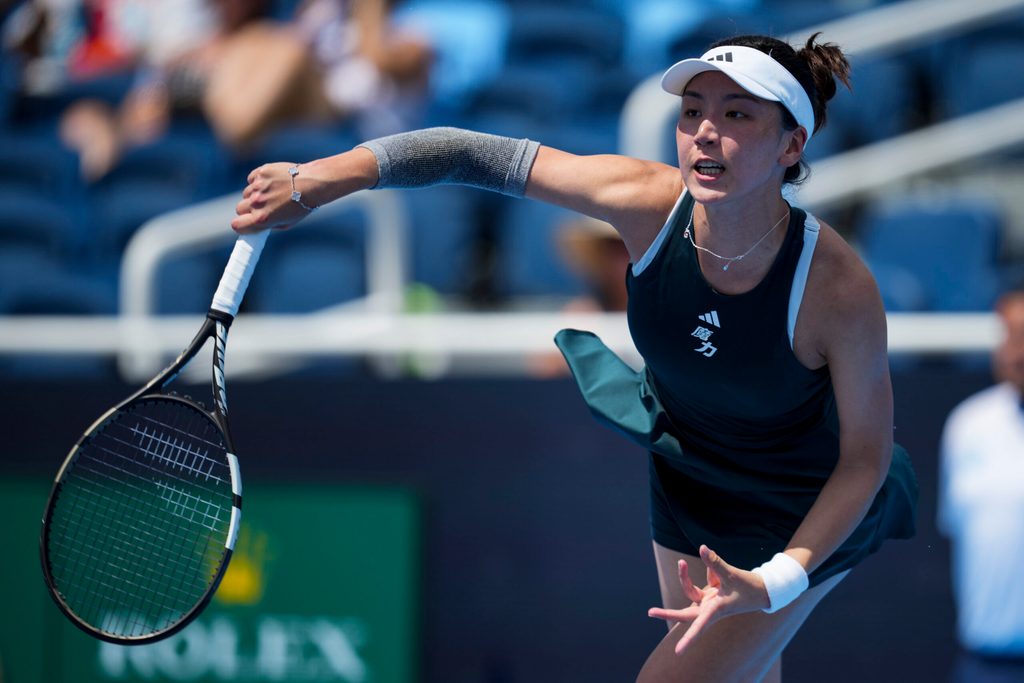 Aug 10, 2025; Cincinnati, OH, USA;  Wang Xinyu (CHN) serves against Coco Gauff (USA) during the Cincinnati Open at the Lindner Family Tennis Center. Mandatory Credit: Aaron Doster-Imagn Images