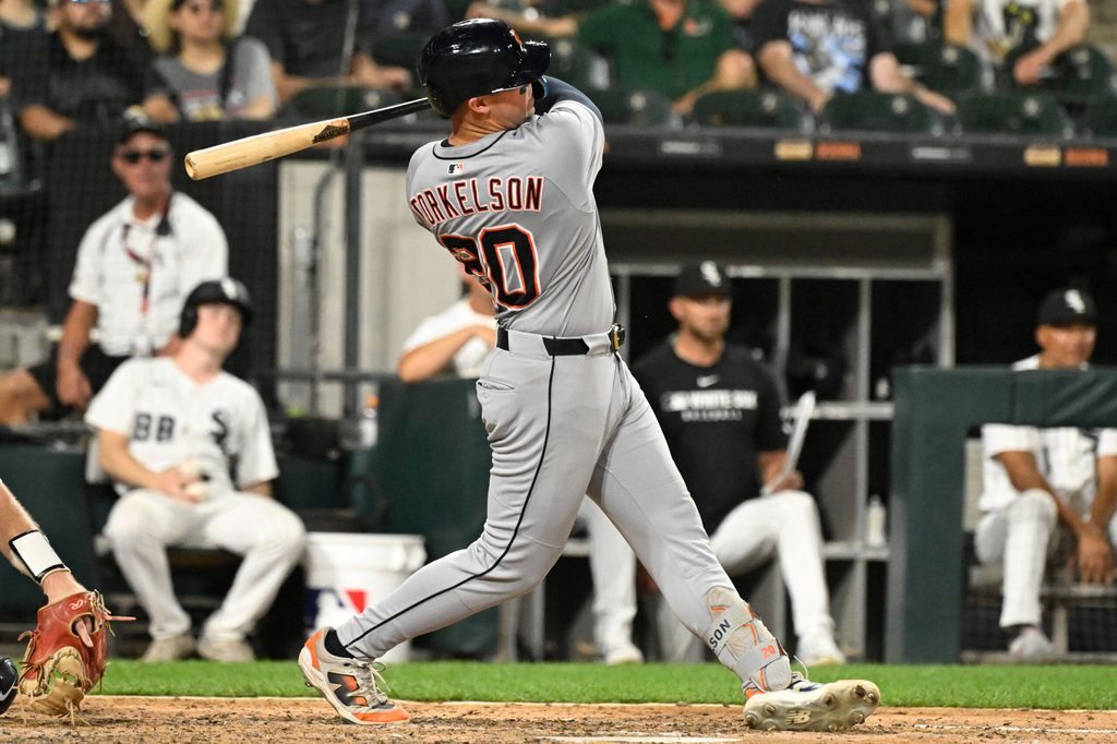 Aug 11, 2025; Chicago, Illinois, USA; Detroit Tigers first base Spencer Torkelson (20) hits a home run during the ninth inning against the Chicago White Sox at Rate Field. Mandatory Credit: Matt Marton-Imagn Images