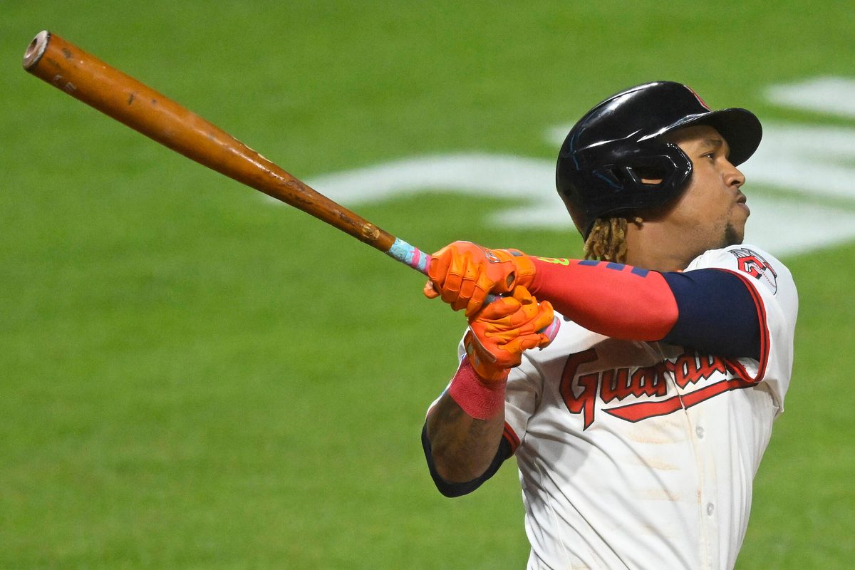Aug 12, 2025; Cleveland, Ohio, USA; Cleveland Guardians third baseman Jose Ramirez (11) hits a solo home run in the eighth inning against the Miami Marlins at Progressive Field. Mandatory Credit: David Richard-Imagn Images