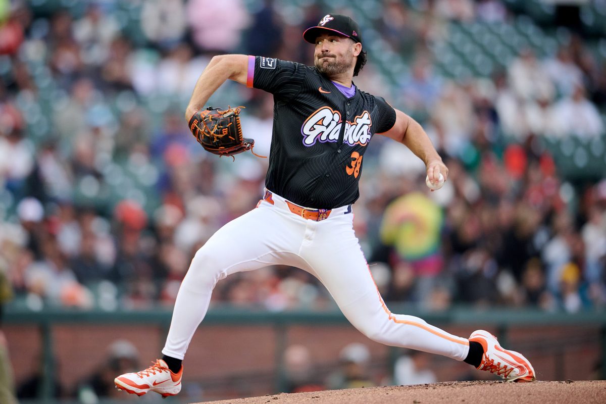 Aug 12, 2025; San Francisco, California, USA; San Francisco Giants starting pitcher Robbie Ray (38) throws a pitch against the San Diego Padres during the first inning at Oracle Park. Mandatory Credit: Robert Edwards-Imagn Images