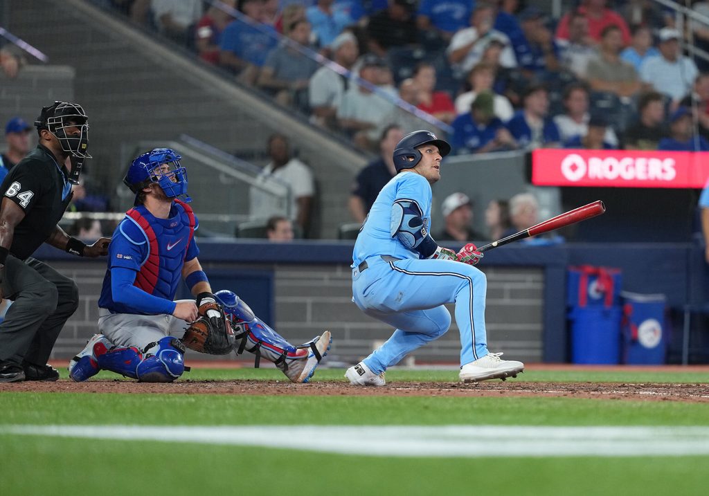 Aug 12, 2025; Toronto, Ontario, CAN; Toronto Blue Jays centre fielder Daulton Varsho (5) reacts after hitting a home run against the Chicago Cubs during the eighth inning at Rogers Centre. Mandatory Credit: Nick Turchiaro-Imagn Images