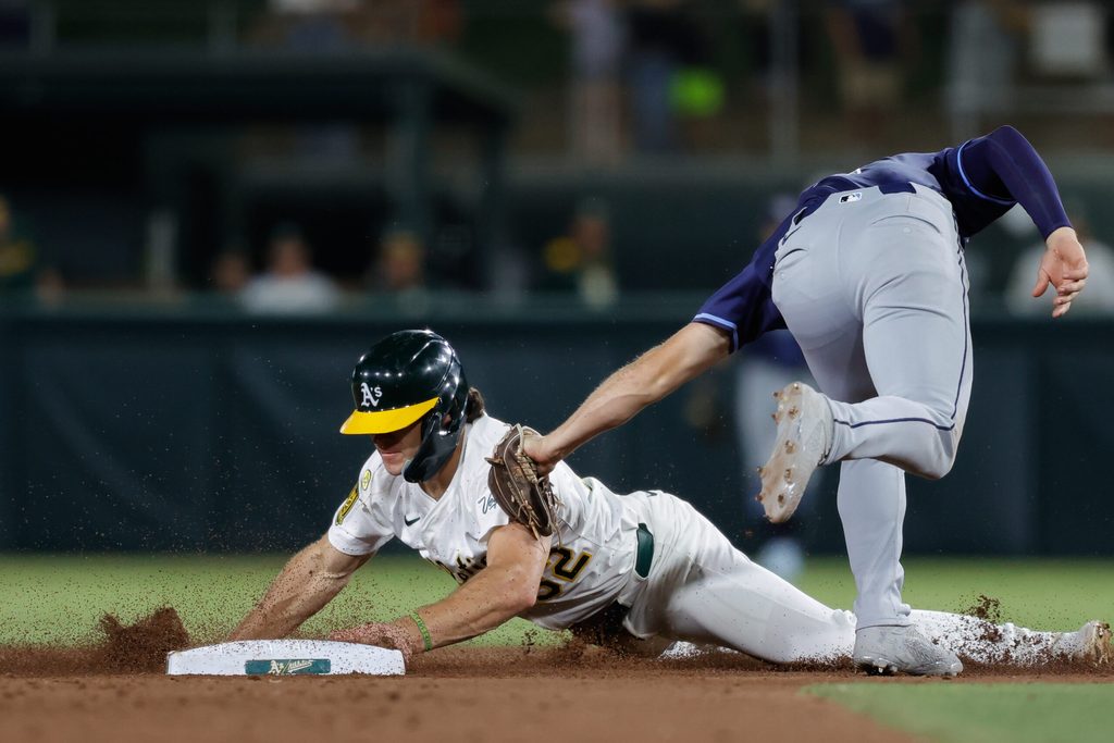 Aug 12, 2025; West Sacramento, California, USA; Athletics right fieler Colby Thomas (32) steals second base during the eighth inning against the Tampa Bay Rays at Sutter Health Park. Mandatory Credit: Sergio Estrada-Imagn Images