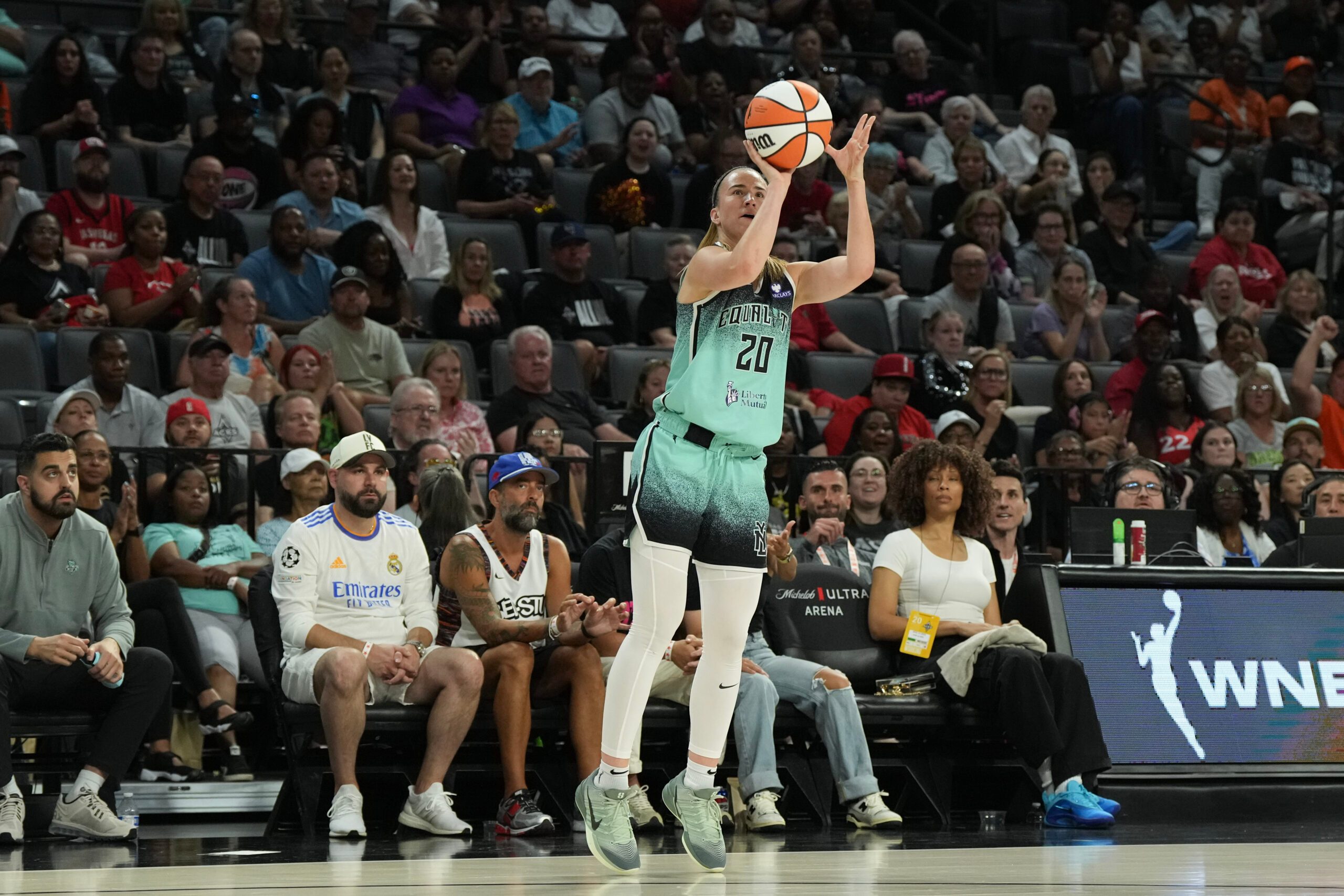 Aug 13, 2025; Las Vegas, Nevada, USA; New York Liberty guard Sabrina Ionescu (20) shoots a 3-pointer against the Las Vegas Aces during the fourth quarter of their game at Michelob Ultra Arena. Mandatory Credit: Candice Ward-Imagn Images