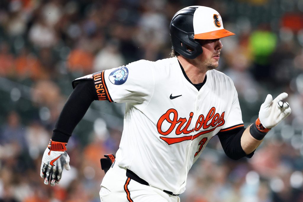 Aug 13, 2025; Baltimore, Maryland, USA; Baltimore Orioles catcher Adley Rutschman (35) runs to first during the second inning against the Seattle Mariners at Oriole Park at Camden Yards. Mandatory Credit: Daniel Kucin Jr.-Imagn Images