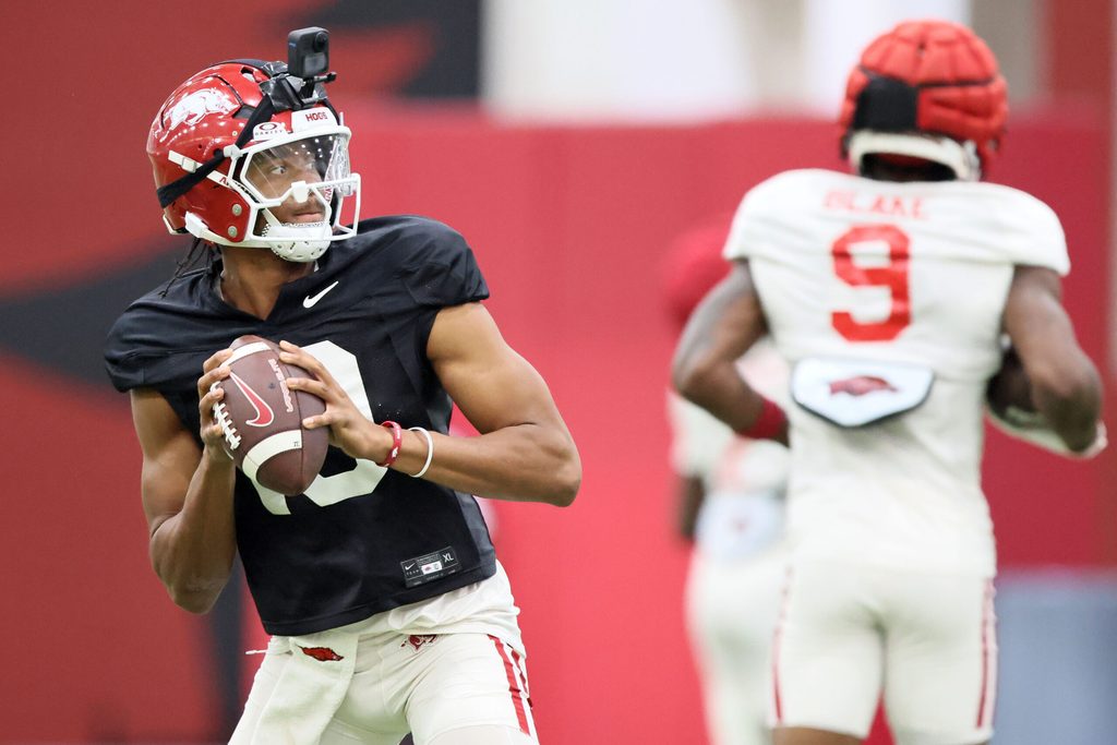 Aug 14, 2025; Fayetteville, AR, USA; Arkansas Razorbacks quarterback Taylen Green (10) drops back to pass during practice. Mandatory Credit: Nelson Chenault-Imagn Images