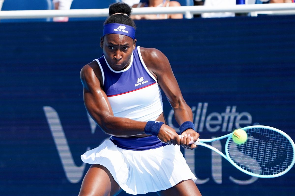 Coco Gauff returns a serve to Lucia Bronzetti in the Cincinnati Open fourth round match between Coco Gauff and Lucia Bronzetti, Thursday, Aug. 14, 2025, at the Lindner Family Tennis Center in Mason. Gauff won 6-2, 6-4.
