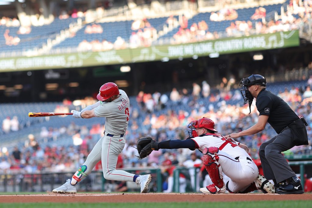 Aug 14, 2025; Washington, District of Columbia, USA; Philadelphia Phillies first baseman Bryce Harper (3) singles against the Washington Nationals during the first inning at Nationals Park. Mandatory Credit: Geoff Burke-Imagn Images