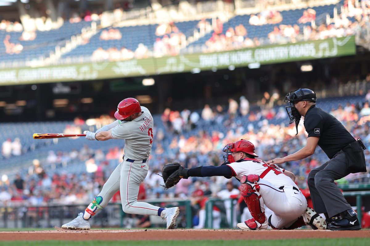 Aug 14, 2025; Washington, District of Columbia, USA; Philadelphia Phillies first baseman Bryce Harper (3) singles against the Washington Nationals during the first inning at Nationals Park. Mandatory Credit: Geoff Burke-Imagn Images