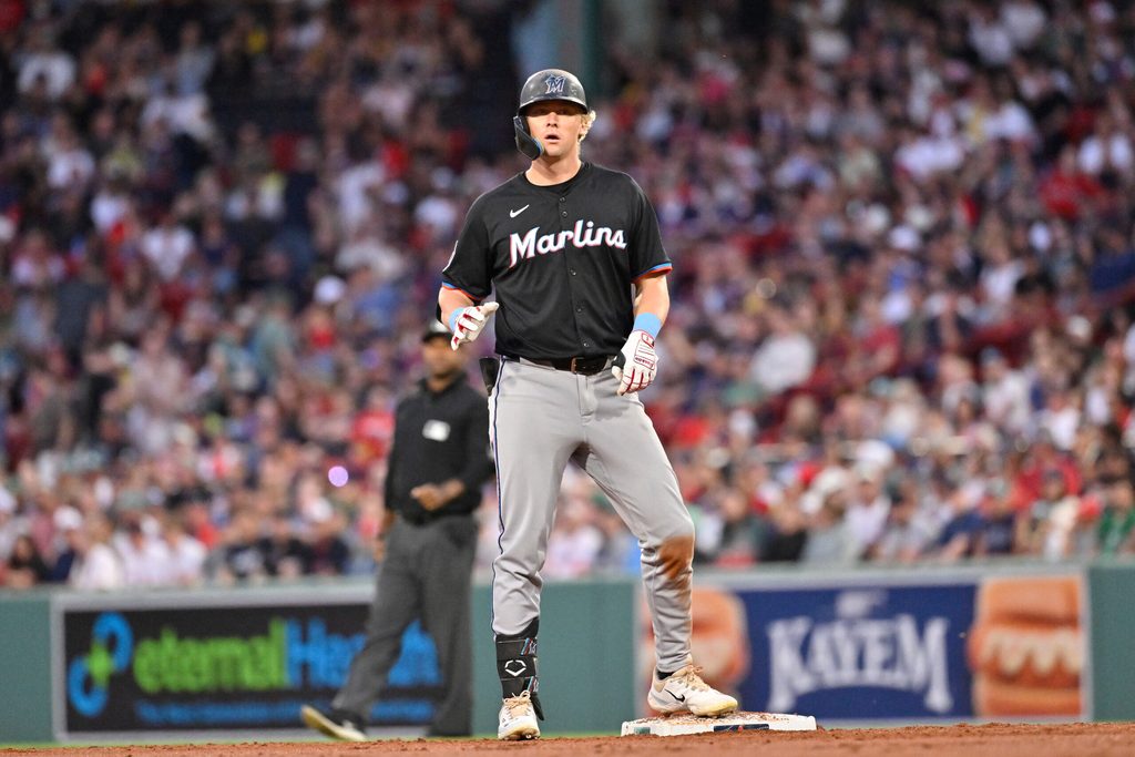 Aug 15, 2025; Boston, Massachusetts, USA; Miami Marlins left fielder Kyle Stowers (28) reacts after hitting a one-run RBI against the Boston Red Sox during the third inning at Fenway Park. Mandatory Credit: Eric Canha-Imagn Images