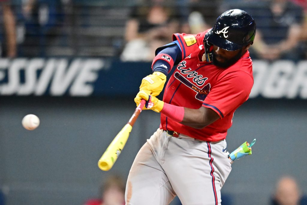 Aug 15, 2025; Cleveland, Ohio, USA; Atlanta Braves center fielder Michael Harris II (23) hits an RBI single during the ninth inning against the Cleveland Guardians at Progressive Field. Mandatory Credit: Ken Blaze-Imagn Images