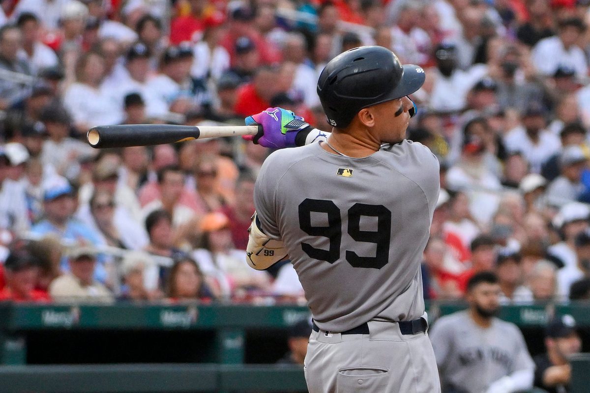 Aug 16, 2025; St. Louis, Missouri, USA; New York Yankees designated hitter Aaron Judge (99) hits a solo home run against the St. Louis Cardinals during the third inning at Busch Stadium. Mandatory Credit: Jeff Curry-Imagn Images