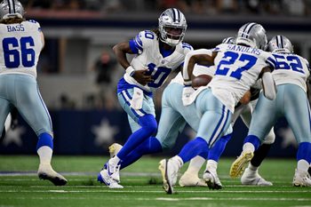 Aug 16, 2025; Arlington, Texas, USA; Dallas Cowboys quarterback Joe Milton III (10) hands off the ball to running back Miles Sanders (27) during the game between the Dallas Cowboys and the Baltimore Ravens at AT&T Stadium. Mandatory Credit: Jerome Miron-Imagn Images