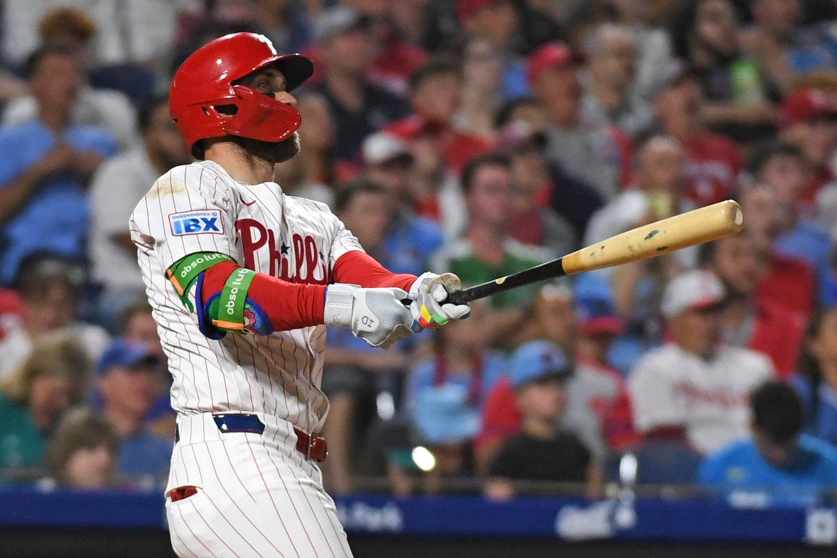 Aug 18, 2025; Philadelphia, Pennsylvania, USA; Philadelphia Phillies first base Bryce Harper (3) watches his three-run home run during the seventh inning against the Seattle Mariners at Citizens Bank Park. Mandatory Credit: Eric Hartline-Imagn Images