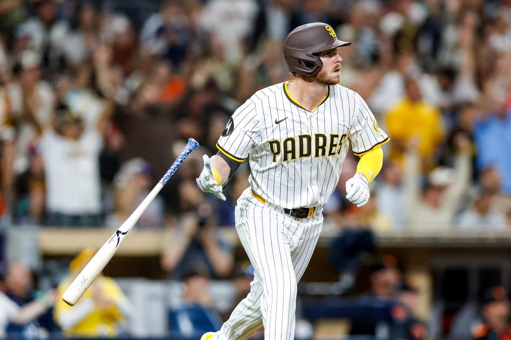 Aug 18, 2025; San Diego, California, USA; San Diego Padres pitch hitter Ryan O'Hearn (32) flips his bat after hitting a two-run home run during the seventh inning against the San Francisco Giants at Petco Park. Mandatory Credit: David Frerker-Imagn Images