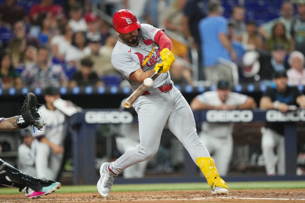 Aug 19, 2025; Miami, Florida, USA;  St. Louis Cardinals designated hitter Iván Herrera (48) singles in two runs against the Miami Marlins in the second inning at loanDepot Park. Mandatory Credit: Jim Rassol-Imagn Images