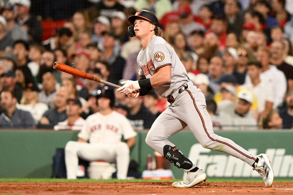 Aug 19, 2025; Boston, Massachusetts, USA;  Baltimore Orioles second baseman Jackson Holliday (7) hits a double against the Boston Red Sox during the fifth inning at Fenway Park. Mandatory Credit: Brian Fluharty-Imagn Images