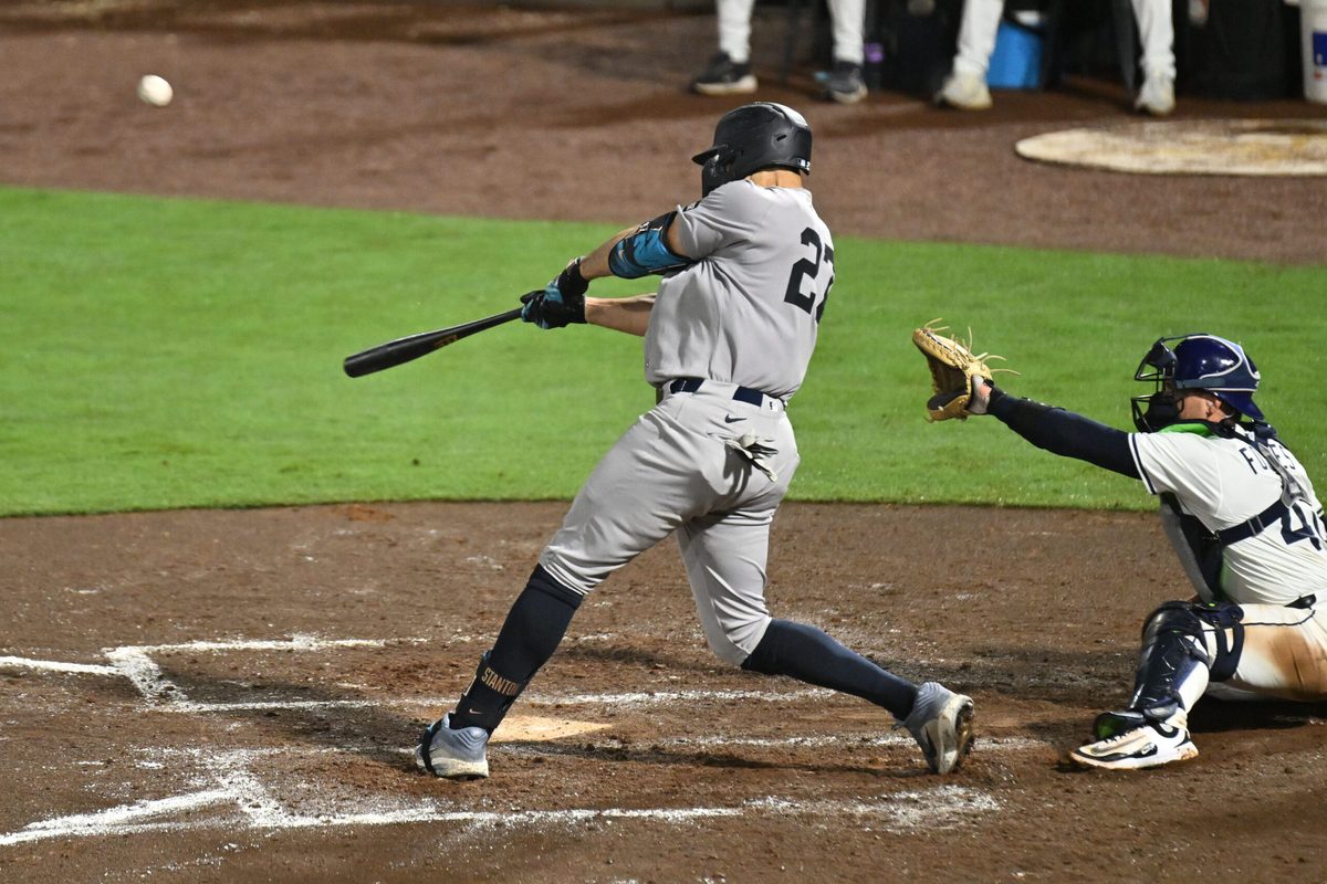 Aug 19, 2025; St. Petersburg, Florida, USA; New York Yankees right fielder fielder Giancarlo Stanton (27) hits a three run home run in the fourth inning against the Tampa Bay Rays  at George M. Steinbrenner Field. Mandatory Credit: Jonathan Dyer-Imagn Images