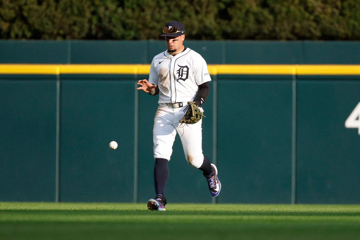 Aug 23, 2025; Detroit, Michigan, USA; Detroit Tigers outfielder Javier Báez (28) retrieves a ground ball hit by Kansas City Royals shortstop Bobby Witt Jr. (7) during the fifth inning at Comerica Park. Mandatory Credit: Brian Bradshaw Sevald-Imagn Images