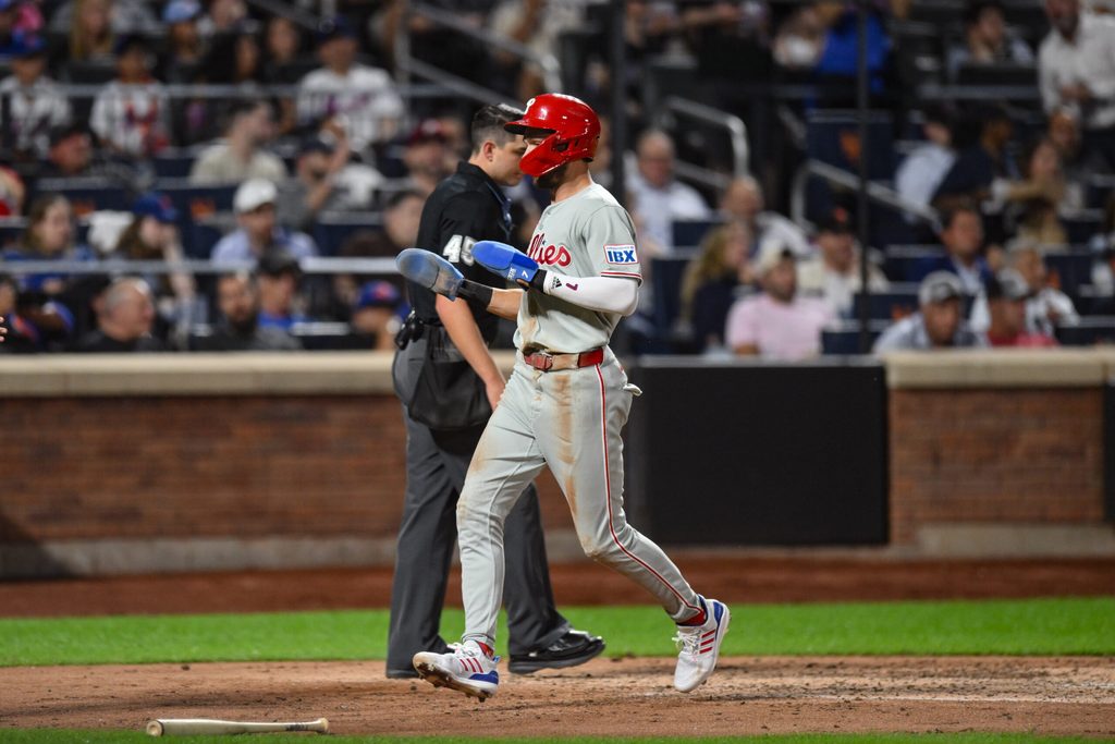 Aug 26, 2025; New York City, New York, USA; Philadelphia Phillies shortstop Trea Turner (7) scores on a RBI single by first baseman Bryce Harper (not pictured) during the fifth inning against the New York Mets at Citi Field. Mandatory Credit: John Jones-Imagn Images