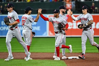 Aug 27, 2025; Baltimore, Maryland, USA;  Boston Red Sox players celebrate the win against the Baltimore Orioles at Oriole Park at Camden Yards. Mandatory Credit: James A. Pittman-Imagn Images