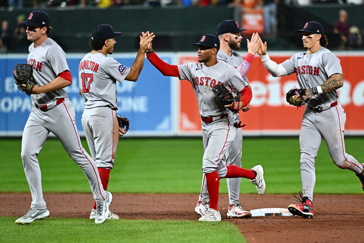 Aug 27, 2025; Baltimore, Maryland, USA; Boston Red Sox players celebrate the win against the Baltimore Orioles at Oriole Park at Camden Yards. Mandatory Credit: James A. Pittman-Imagn Images