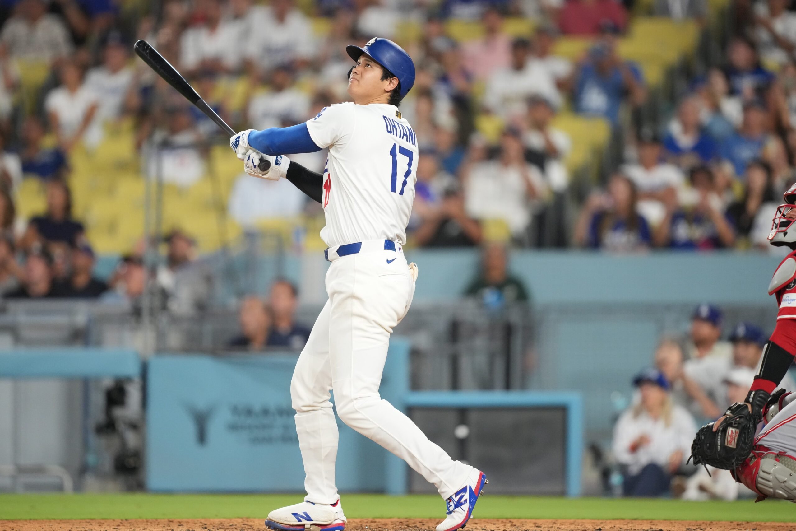 Aug 27, 2025; Los Angeles, California, USA; Los Angeles Dodgers starting pitcher Shohei Ohtani (17) flies out to left field in the eighth inning against the Cincinnati Reds at Dodger Stadium. Mandatory Credit: Kirby Lee-Imagn Images