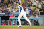 Aug 27, 2025; Los Angeles, California, USA; Los Angeles Dodgers starting pitcher Shohei Ohtani (17) flies out to left field in the eighth inning against the Cincinnati Reds at Dodger Stadium. Mandatory Credit: Kirby Lee-Imagn Images
