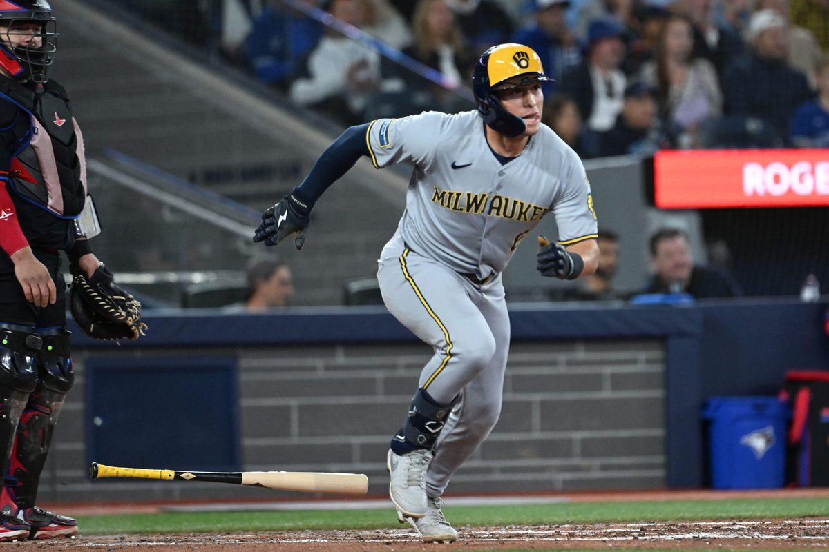 Aug 29, 2025; Toronto, Ontario, CAN; Milwaukee Brewers left fielder Isaac Collins (6) hits a single against the Toronto Blue Jays in the fifth inning at Rogers Centre. Mandatory Credit: Dan Hamilton-Imagn Images
