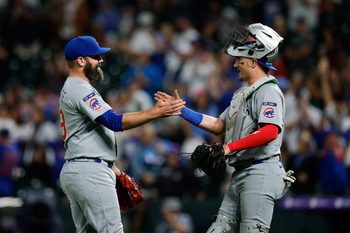 Aug 29, 2025; Denver, Colorado, USA; Chicago Cubs pitcher Andrew Kittredge (59) celebrates with catcher Reese McGuire (20) after the game against the Colorado Rockies at Coors Field. Mandatory Credit: Isaiah J. Downing-Imagn Images