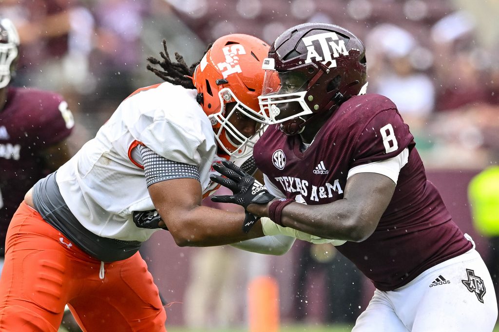 Sep 3, 2022; College Station, Texas, USA; Texas A&M Aggies defensive lineman Anthony Lucas (8) and Sam Houston State Bearkats offensive lineman Moses Johnson (73) in action during the second half at Kyle Field. Mandatory Credit: Maria Lysaker-Imagn Images