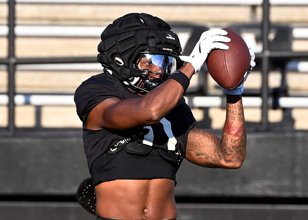 Vanderbilt wide receiver Junior Sherrill (0) catches a pass before an NCAA college football scrimmage Saturday, Aug. 10, 2024, in Nashville, Tenn.