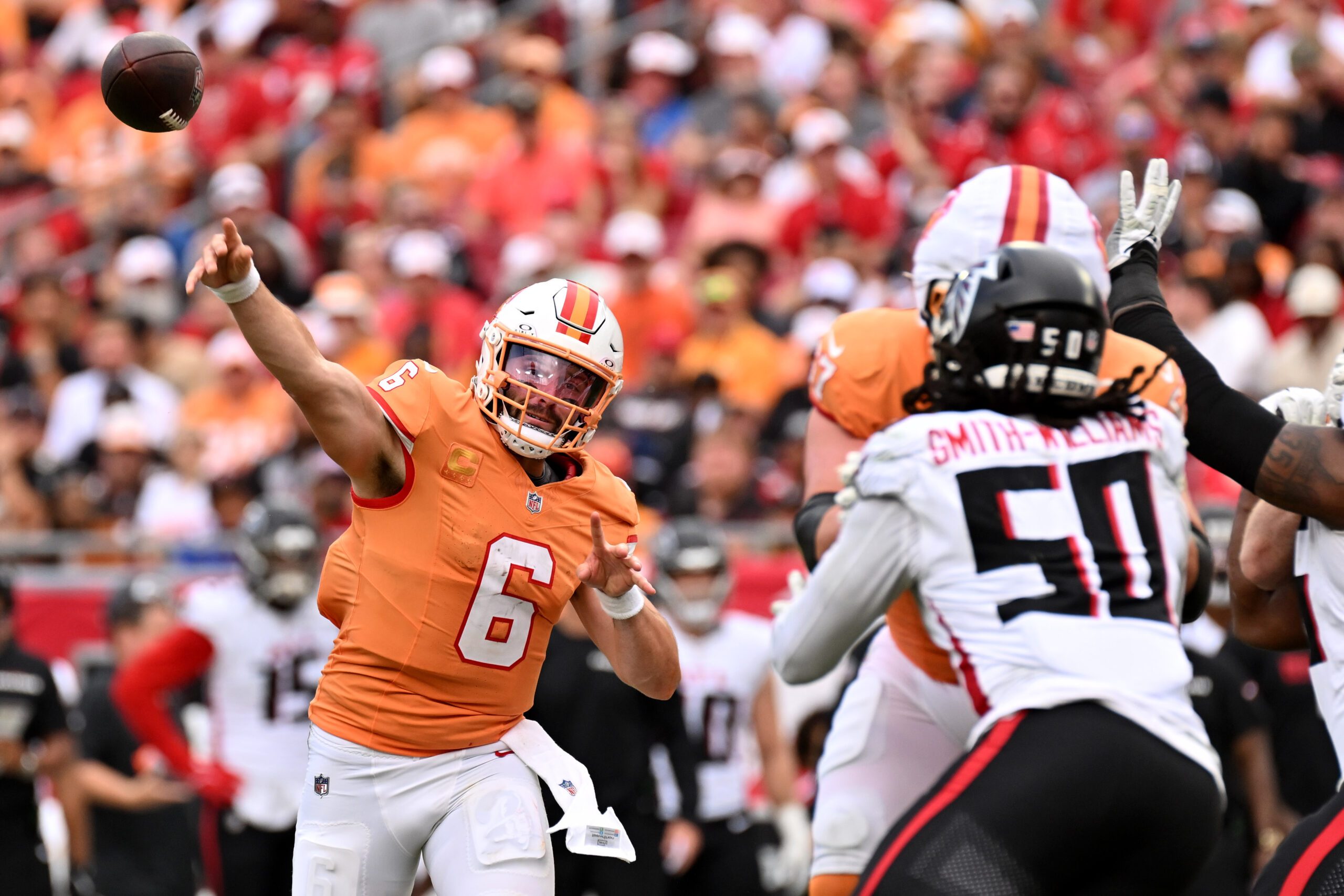 Oct 27, 2024; Tampa, Florida, USA; Tampa Bay Buccaneers quarterback Baker Mayfield (6) throws a pass in the second half against the Atlanta Falcons at Raymond James Stadium. Mandatory Credit: Jonathan Dyer-Imagn Images