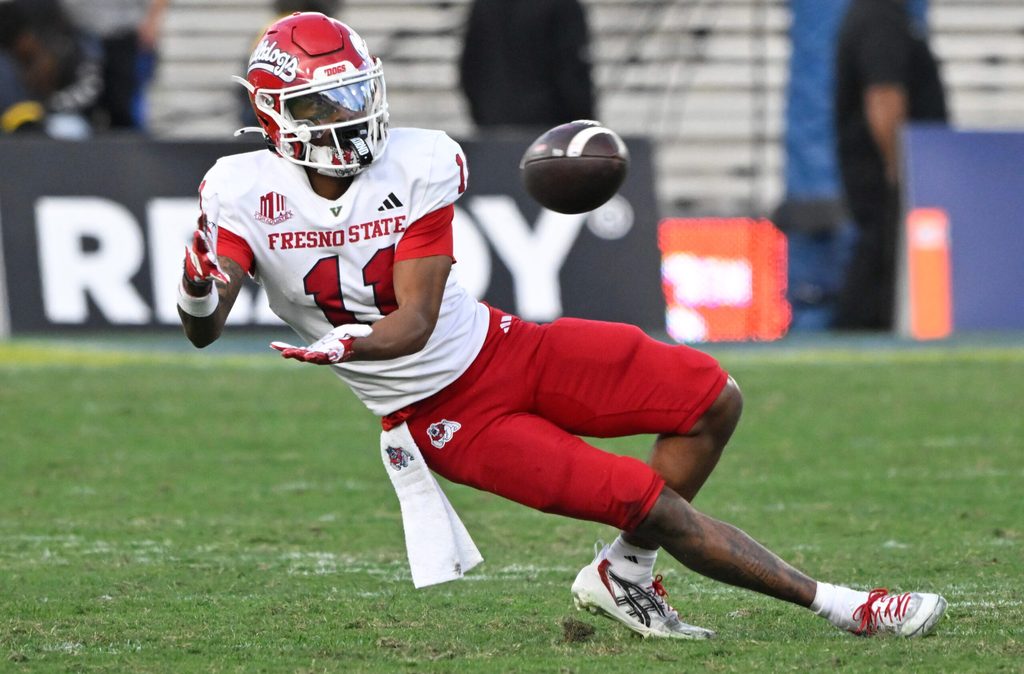 Nov 30, 2024; Pasadena, California, USA; Fresno State Bulldogs wide receiver Raylen Sharpe (11) makes a catch during the fourth quarter against the UCLA Bruins at Rose Bowl. Mandatory Credit: Robert Hanashiro-Imagn Images